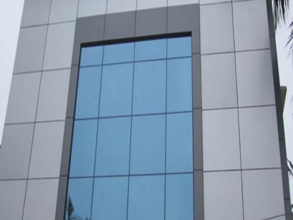 What are the properties of glass facade systems?